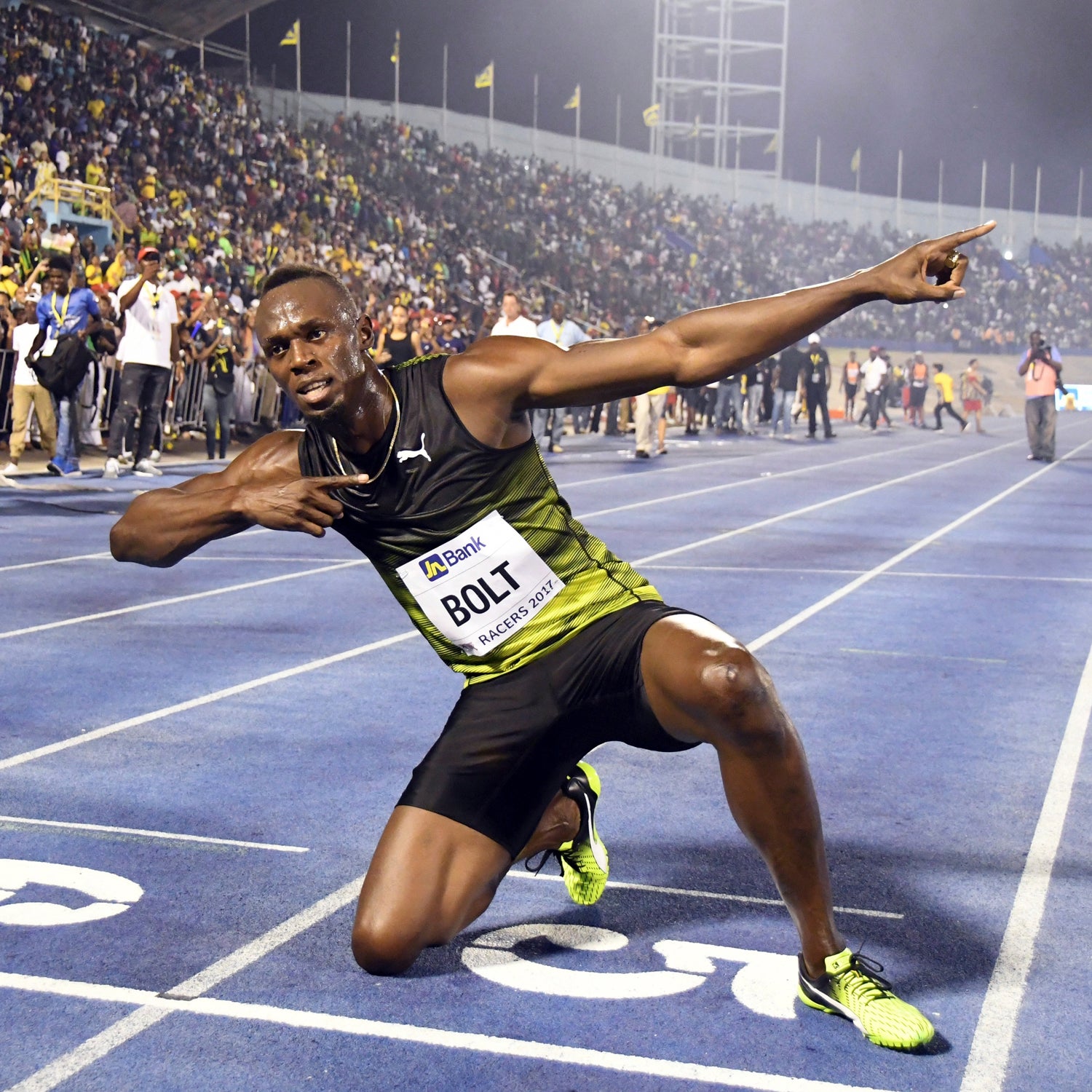 Jamaica's Usain Bolt celebrates after winning the