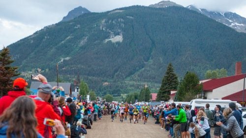 Spectators line the streets of Silverton, Colorado, at 6 a.m. on Friday, July 14, for the start of the race. The 100-mile race, which takes runners up a total of 33,050 vertical feet, connects the towns of Silverton, Ouray, and Telluride. This year’s run saw a noticeable increase in spectators.