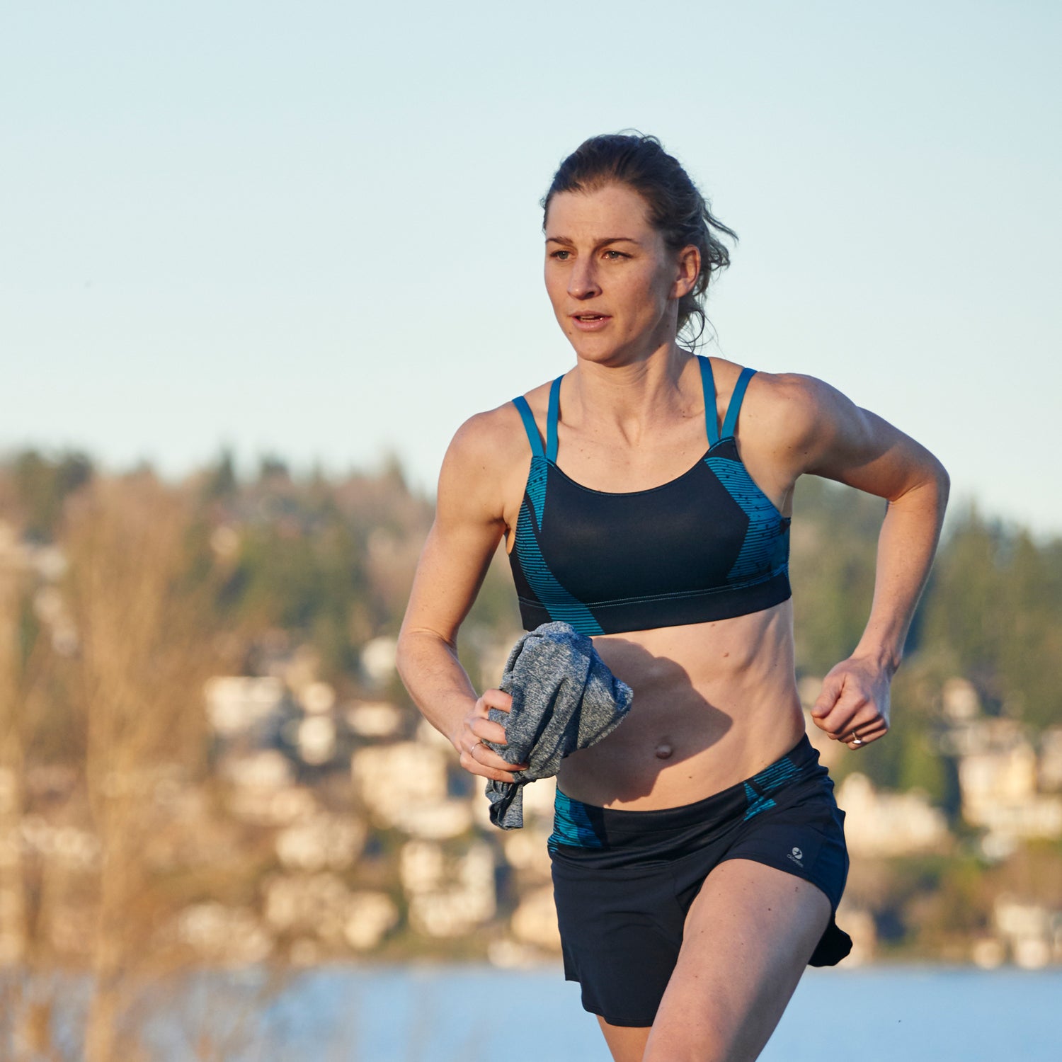 Lauren Fleshman running in Oiselle's Summer Roga shorts.