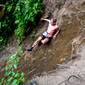 Trey Ingalls of Seward, AK, makes a controlled slide down an embankment in the junior's race.