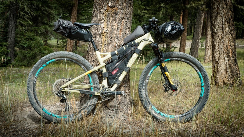 Salsa's Anything Cradle Plus Dry Bag, Seatpack, Top Tube Bag, and Spearfish Frame Bag.