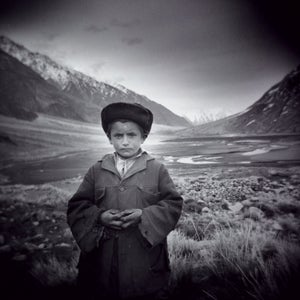 A World Apart: A young Wakhi at Koh-i-Bardar base camp, in northeastern Afghanistan, May 2005.