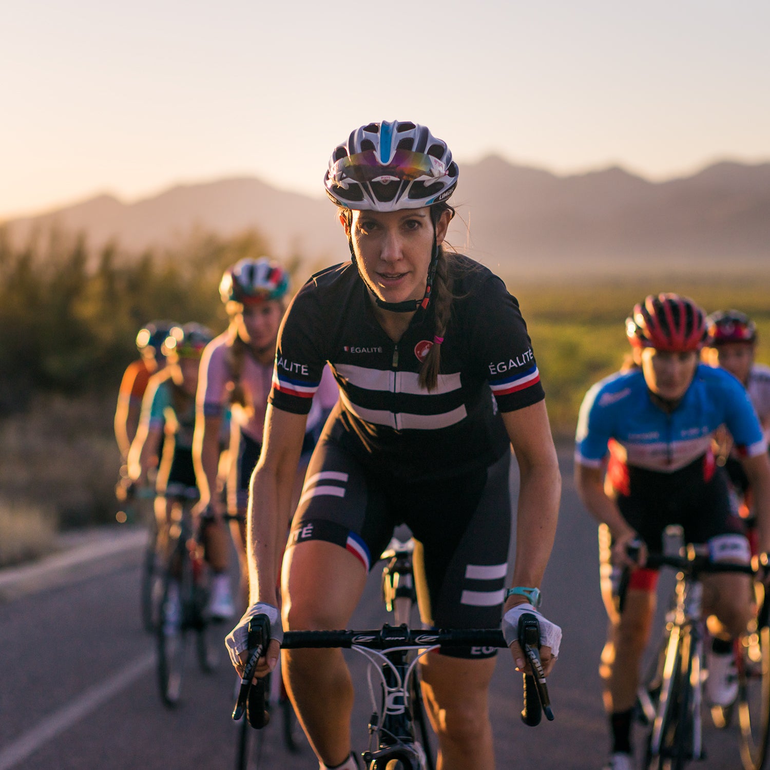 Bertine leading a group ride in Arizona’s Saguaro National Park.