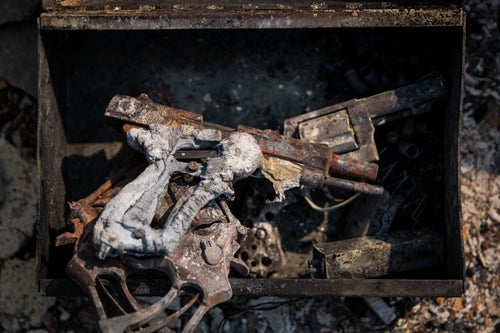The remains of retired law enforcement officer Bob Stewart's handguns in his burned out house in the Coffey Park neighborhood of Santa Rosa, California on October 13, 2017. As of Friday night, the Tubbs Fire had burned more than 2,000 homes in the Santa Rosa area.