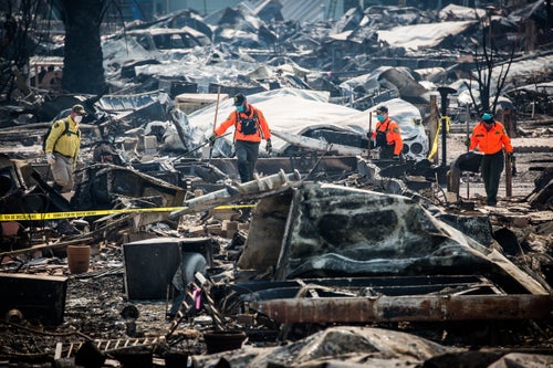 Search and rescue crews look for bodies in the remains of the Journey's End Mobile Home Park in Santa Rosa, California on October 13, 2017. As of Friday night, the Tubbs Fire had burned more than 2,000 homes in the Santa Rosa area.
