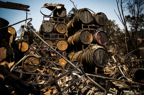 Racks of wine barrels sit in the remains of the Paradise Ridge Winery in Santa Rosa, California on October 13, 2017. As of Friday night, the Tubbs Fire had burned more than 2,000 homes in the Santa Rosa area.