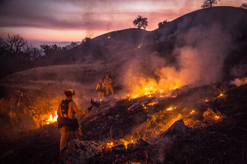 Firefighters monitor a section of the Pocket Fire near Geyserville, California on October 13, 2017. As of Friday night, the Pocket Fire had burned more than 10,000 acres and was 5% contained. an eye on a section of the Pocket Fire near Geyserville, California on October 13, 2017. As of Friday night, the Pocket Fire had burned more than 10,000 acres and was 5% contained.