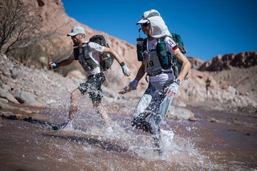 Stage 2: The course offers stunning and sometimes above knee freezing water crossings. Angela from germany and 1st female runner overall glides through this corssing, making things look easy.