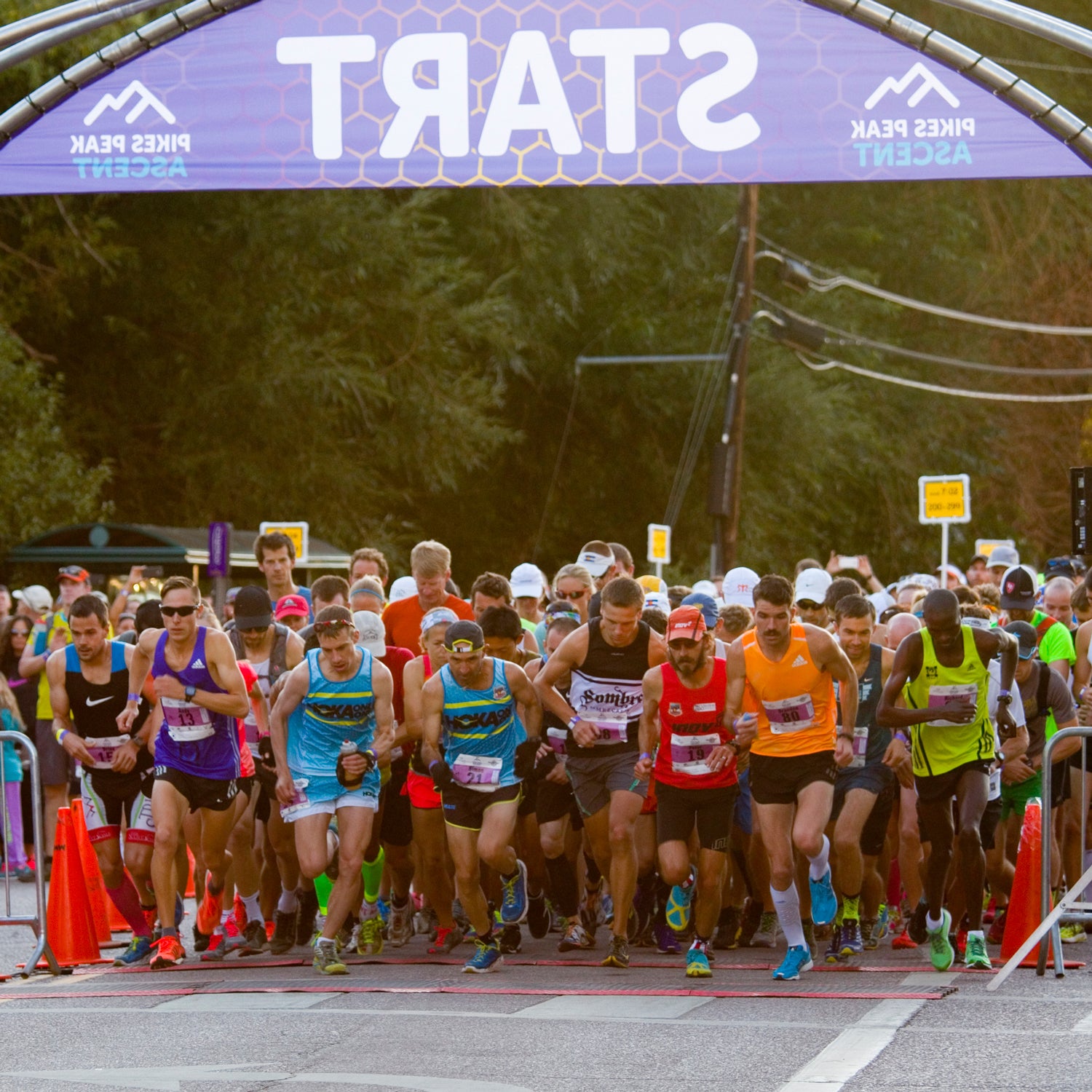 Runners at the starting line in a rugged race up 14,115 foot Pikes Peak in Manitou Springs, Colorado.