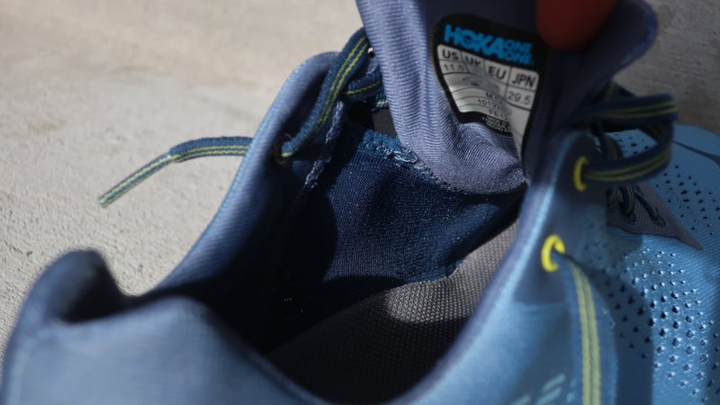 The upper is double layered. There's a stretchy bootie underneath the knit mesh exterior.