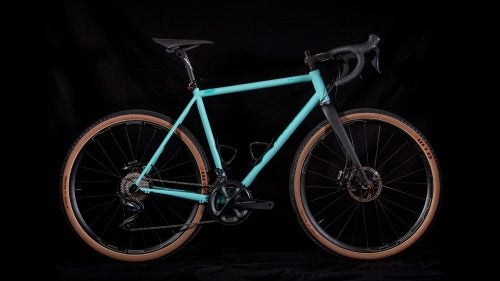 The Grimes R1 looks a bit like your father’s steel frame, but it hides all the goodies we crave: oversize head tube, 12mm thru axles front and rear, routing that accommodates Di2, disc brakes, and a threaded English bottom bracket. The bottom bracket is high enough that you could race cross, but still low enough for stability cruising dirt roads. One thing a few testers noted: the reach is fairly long, so expect a fairly stretched out position (or plan accordingly with a shorter stem).