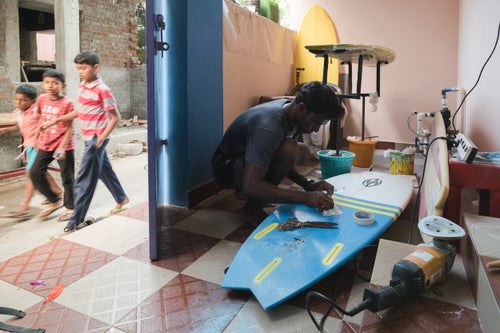 Raghul Paneerselvam placed first in the senior’s category in the Covelong Point surf competition held during the height of the southwest monsoon season. He took away a cash prize for his placing. Aside from being a talented surfer, Raghul also shapes surfboards and uses his family’s ground level porch as a repair shop for all the surfboards that get damaged. Raghul fixed my surfboard as well during my stay in Mahabalipuram.