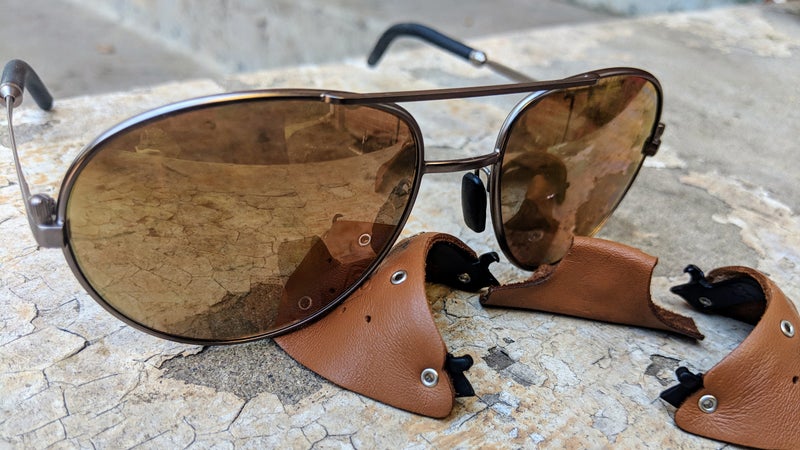 The leather shields clip right off if you just want a classic aviator shape without the added glare protection.