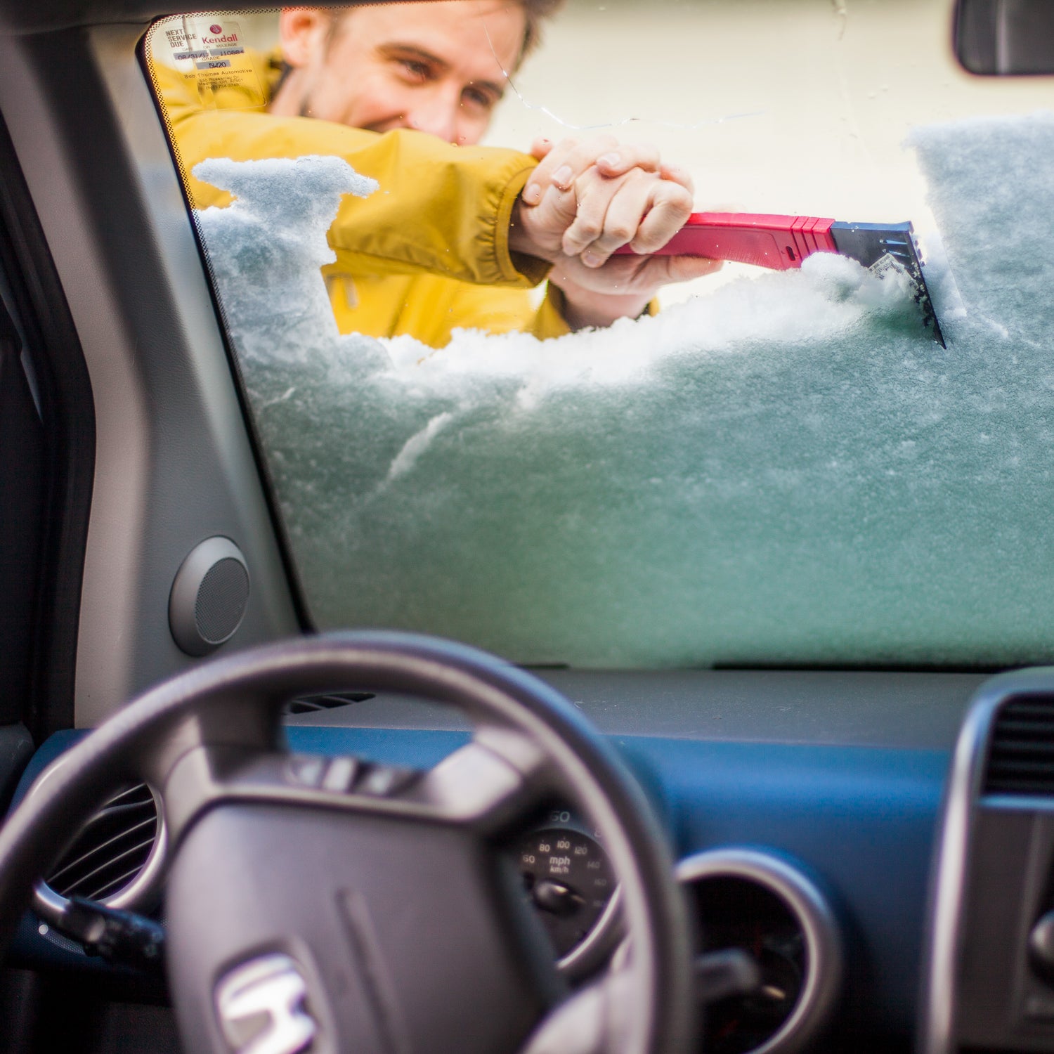 Take a tip from our Tough Love columnist Blair Braverman—draping a tarp over your windshield saves time scraping.