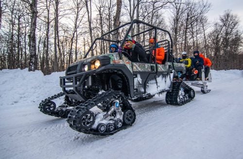 Some climbs are located deep in the back country. So how does one access the inaccessible? Why a five star limo ride of course. Back Country classes where shuttled out to the climbs via various off roading vehicles specifically designed for navigation in deep snow. In true upper Michigan style it was the perfect mix of classic local personality and first time excitement.
