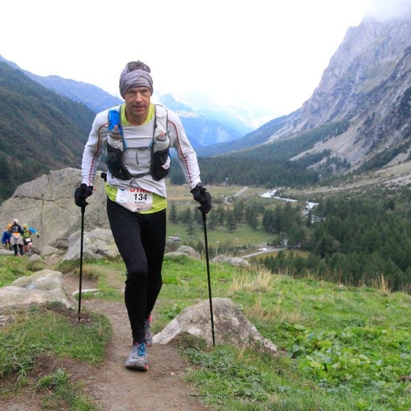 Pushing hard on my poles at UTMB, climbing out of Arnouvaz towards Grand Col Ferret shortly after sunrise at Mile 61.