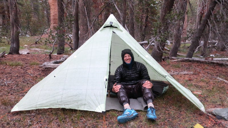 An insulated jacket (and pants) are crucial for maintaining body heat with minimal weight. Bonus: Wear them at night so you can carry a lighter sleeping bag.