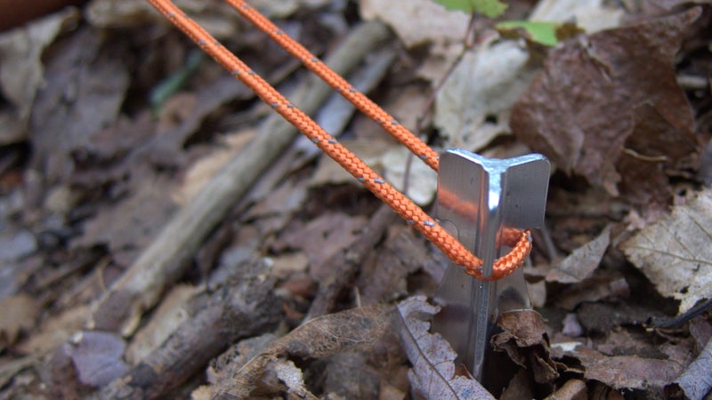 My preferred setup: conventional two- or three-millimeter reflective cord with a 0.5-ounce aluminum Y-stake.