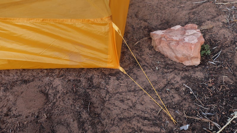 The rear corners of the inner and fly must be staked out to maximize interior space and weather resistance. The stock system offers no tension adjustment or adaptability—like if, say, a rock or root prevents stake placement. I strongly recommend replacing it with a better system.