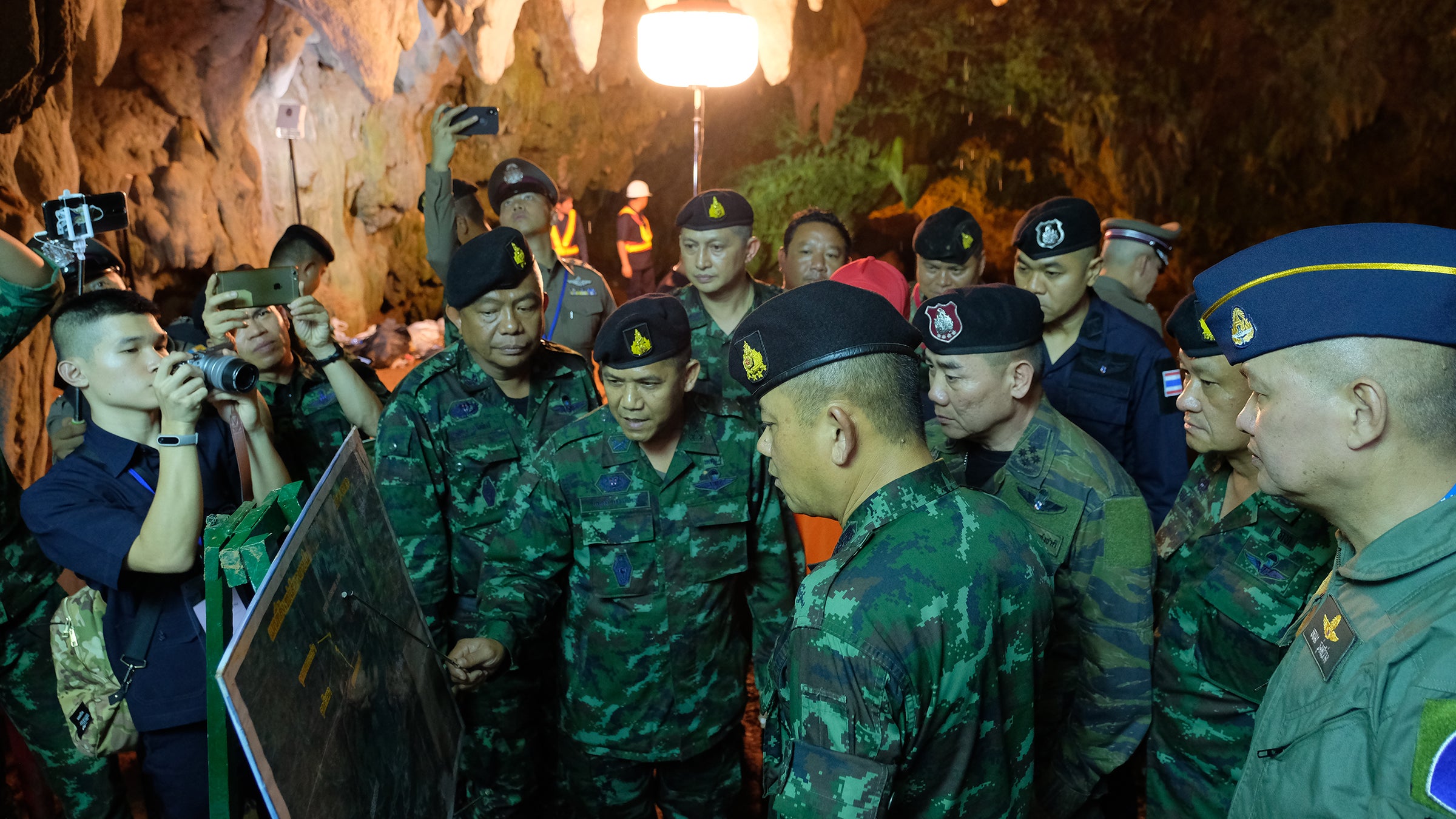 Thai officers supervise the rescue mission inside Tham Luang Nang Non cave on June 28.