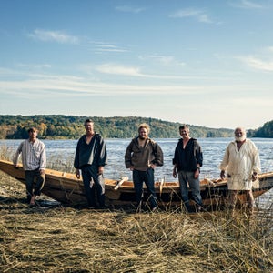 The expedition: (from left) Wilder Nicholson, the author, Ben Schott, John Abbott, and boatbuilder Rob Stevens launch their bateau on the Kennebec River outside Pittston, Maine