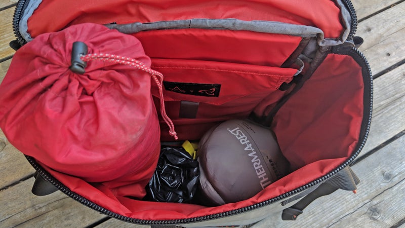 And here it is with an ultralight 1P tent, just to demonstrate that you really could go backpacking out of a 21-liter pack.