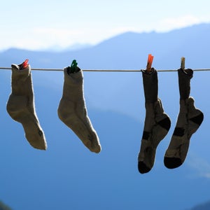 Socks drying on clothesline in mountains