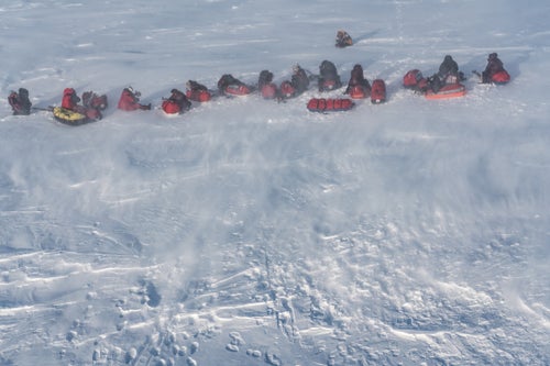 At 2:30 a.m., hunching against blowing snow and the howl of the chopper, the team is left on a crust of frozen Arctic Ocean huddled with what they’ll need to survive for 12 days. It’s time to move—standing around in these temperatures can be fatal. The team clicked into their bindings and strapped on harnesses as the MI8 chopper became tinier and tinier, disappearing into the frigid blue Arctic sky.