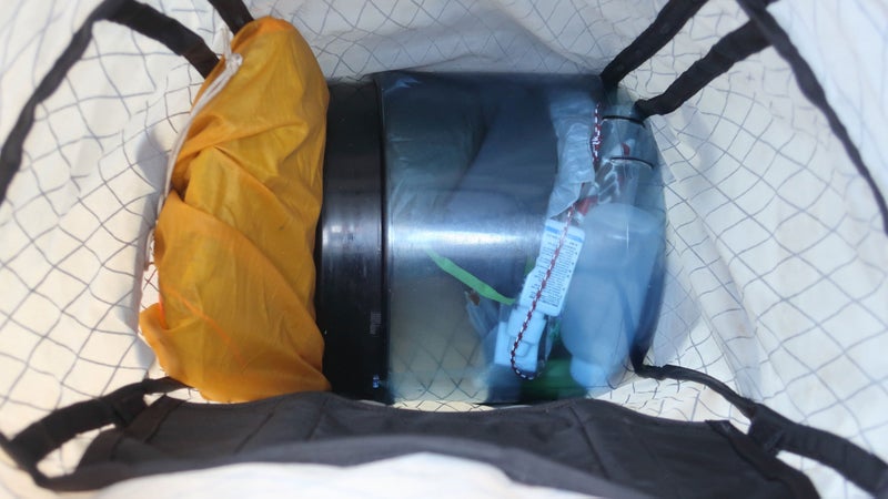 The main compartment of the Marl fits a BV450 nicely, with a little bit of room to spare. I was able to slide a folded-up tarp next to it.