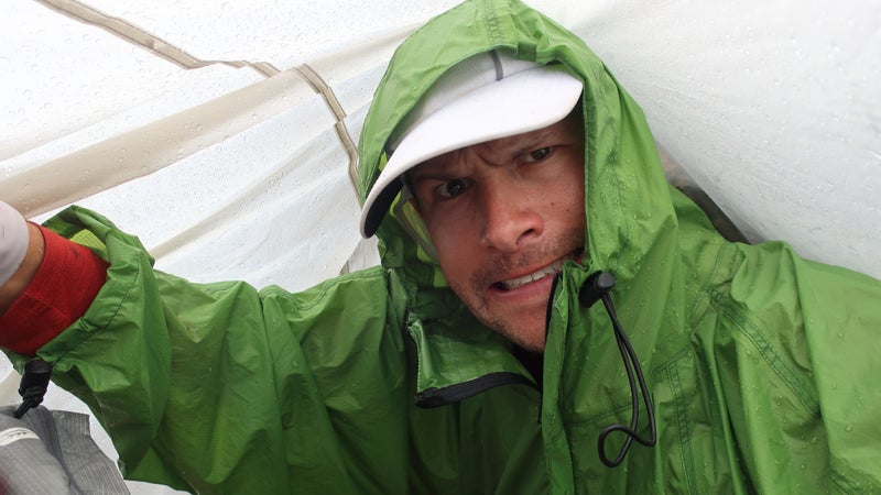 Maybe you had to be there. I’m hunkered down at the top of Northeast Gully, the crux feature on the Pfiffner Traverse. An out-of-view thunderstorm hit me when I reached the top, forcing me to hunker down between boulders at 12,000 feet and drape my shelter over me.