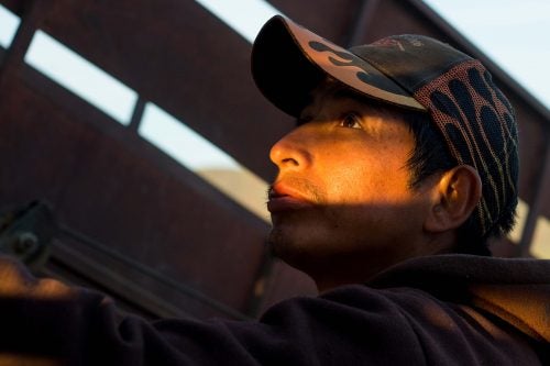 Casely DeLaCruz, 32, watches sheep as they are loaded into a truck near Moxee, Wash., Friday, May 13, 2016. Wool products are becoming more and more popular in the United States. The American Sheep Industry Association states that in 2007, 70 percent of American wool was exported. In 2017, only 50 percent was. Workers like Casely are increasingly valuable to the sheep industry in the United States. Peruvian migrant workers bring husbandry knowledge from their home country and fill jobs that American workers wouldn't normally take on. (Sofia Jaramillo)