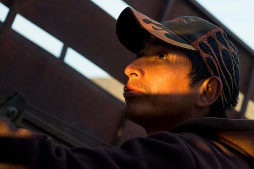 Casely DeLaCruz, 32, watches sheep as they are loaded into a truck near Moxee, Wash., Friday, May 13, 2016. Wool products are becoming more and more popular in the United States. The American Sheep Industry Association states that in 2007, 70 percent of American wool was exported. In 2017, only 50 percent was. Workers like Casely are increasingly valuable to the sheep industry in the United States. Peruvian migrant workers bring husbandry knowledge from their home country and fill jobs that American workers wouldn't normally take on. (Sofia Jaramillo)