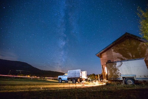 Heraclio DeLaCruz's trailer is parked at a ranch near Ellensburg, Wash. Most of the sheepherders who work for the S. Martinez operation are married men in their 40s or older with families back in Peru. Throughout the year they work alone, living in small trailers, camping out under the stars, providing for their wives and children back home in Peru. (Sofia Jaramillo)