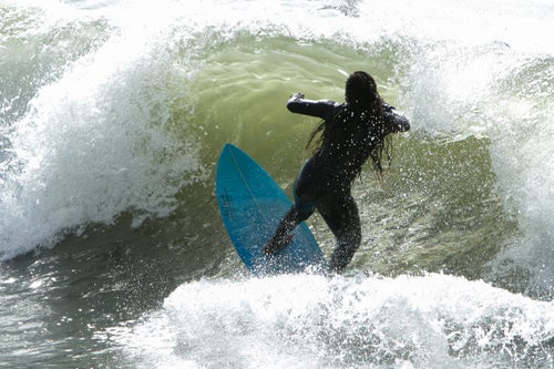 This is the first time Sambe has ever left Senegal, and she plans to travel the world for surfing competitions. To represent her country in Tokyo, Sambe must rank in the World Surfing League (WSL) by competing in sanctioned competitions in Peru, Brazil, France, and Australia in the coming year. She’s currently one of three Senegalese members of the WSL, and the only woman.
“I love surfing and I want to represent my country. I want to represent my country as well as girls,” Sambe says in her second language of French (her first is Wolof, a common West African language). If Sambe ranks highly enough, she will compete against hundreds of other women to get one of the 20 coveted spots when surfing makes its debut as an Olympic sport in 2020. Her next stop will be Lima, Peru, where she plans on competing in the Pan American Games this coming July.