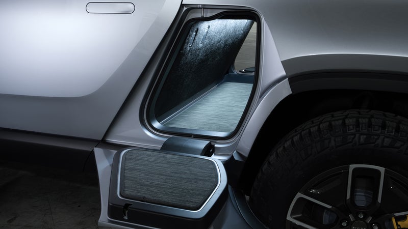 This tunnel opens on both sides of the truck, behind the rear doors. It's got a light, it's got carpet, and it locks. Perfect for skis, snowboards, rifles or shotguns, or just your off-road recovery gear. It's my favorite thing on the whole vehicle.