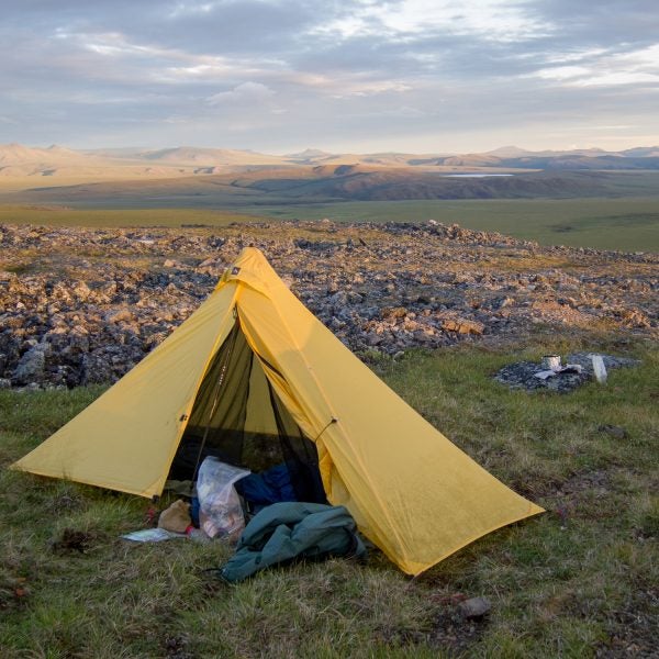 Sunset in the Yukon Arctic. My food was stored in the clear OPSAK at the front of the shelter.