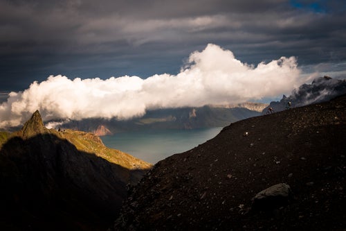 Schumann and Philipp ride from the summit of the 9002 ft high dormant volcano of Mount Paektu. Located in the far North-East corner of North Korea, Paektu is the highest point on the entire Korean peninsular and is considered sacred by the Korean people. Paektu’s dominance, both geographically and within North Korean ideology and politics, made this a must-ride destination for the team, despite its remote and hard-to-reach location.