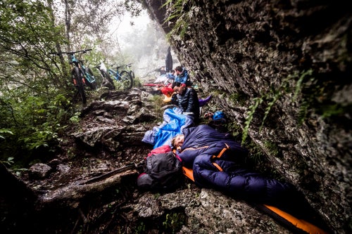 Following a 5300 ft ascent the day before, we woke to a cold, rainy morning after an overnight bivouac under a rock slab on Mount Myohyang. The bivouac experience highlighted the willingness of our North Korean guides to be flexible in how they catered for our adventure aspirations, as well as helping cement bonds throughout the team. This was the first ever camping experience for one of our guides.