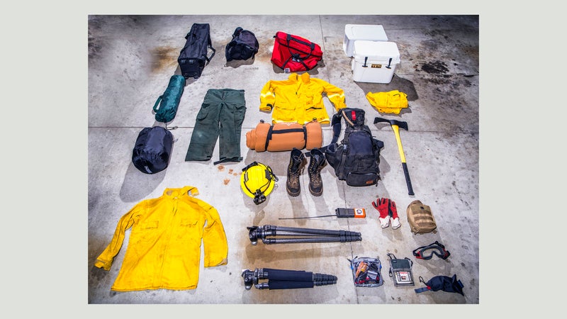 In addition to all his camera stuff, Palley has to wear or carry all this fire safety gear too.