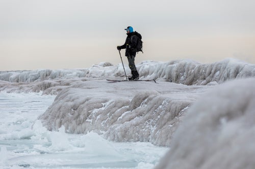 Ozner takes a closer look at the incoming ice on the lake at 63rd Street Beach before continuing south along the frozen lake.