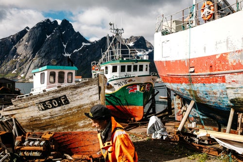 @TinyAtlas isn’t your average (basic) travel Instagram account. Sure, at first glance it boasts thousands of incredible photographs, of everything from rigid city architecture to cuddly-looking alpacas. But the difference is that every image is accompanied by a meaningful personal narrative—highlighting the people, places, and stories behind each shot. These deeper connections are what led Oakland-based photographer Emily Nathan to create Tiny Atlas Quarterly in 2012. Although she was finding great success in commercial lifestyle and travel work, she wanted a project that would fulfill her creatively. Now, seven years later, Tiny Atlas has not only served that need, but it has evolved into more than a publication: it has become a community, with its Instagram hashtag (#mytinyatlas) featuring over seven million posts from readers’ travels. Next month, Nathan is releasing her first photo book, My Tiny Atlas: Our World Through Your Eyes which houses work from 130 of these TAQ contributors. Here, we’ve selected a few of our favorite photographs featured in the book.
Norway's northwestern coast is sprinkled with Lofoten's six principle islands and hundreds of uninhabited ones. The four-hour ferry ride is well worth the time for the experience of exploring the brightly colored fishing villages and fjords, and beaches visited by surfers year-round. —My Tiny Atlas