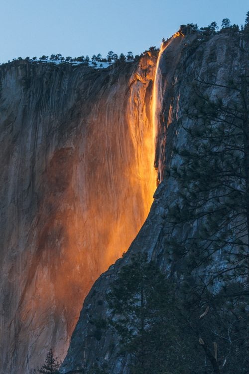 For a few days each year around the second week of February, Horsetail Falls, on the eastern side of El Capitan in Yosemite, can turn into what is known colloquially as “firefall.” When the sky is clear, and there has been good snowfall—and also sunshine to melt it—the rays of the setting sun illuminate the falling water, making it glow red and orange against the darkened cliffs. Even when the conditions are perfect, the phenomenon lasts for only about ten minutes. —My Tiny Atlas