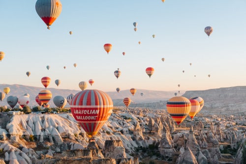 If you follow enough travel-focused Instagram accounts, you’ve probably experienced the digital awe of the hot air balloons in Cappadocia, Turkey. To see them in person, however, is to be dropped straight into a fairytale.
