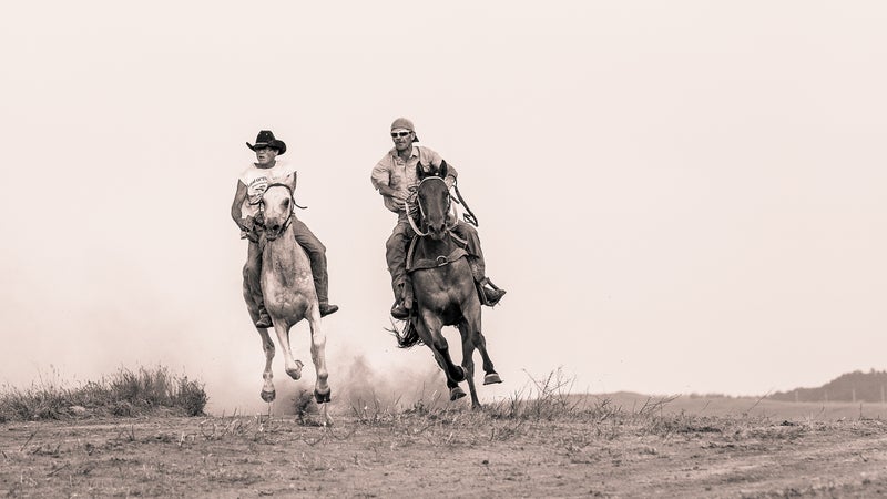 Stan Brewer Sr. (right) racing a friend