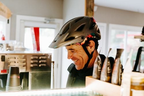 8:07 A.M.
Chris, TKage, starts most days with a black coffee, sometimes a doughnut, at Equator Coffee on Shoreline Highway. “Not only do they have great coffee, it’s like a community center. It’s a nice way to start the day, to see friendly faces and meet new people and just kind of have a hug.”