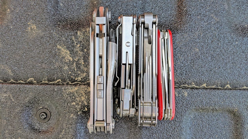 A comparison of thicknesses: (from left to right) the Gerber Center-Drive, the Leatherman Sidekick, the Leatherman Free P4, and the Swiss Army Spartan