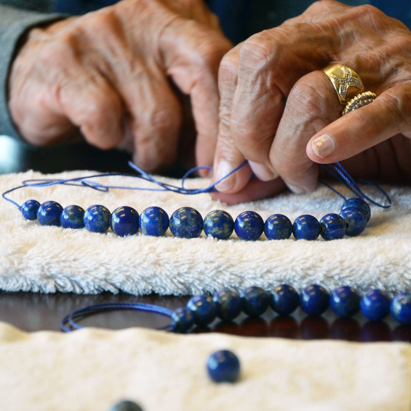 This jewelry offers Afghan war widows both emotional support and a path to financial security.