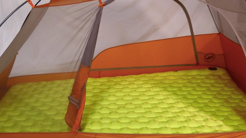 The Q-Core SLX tent floor pad covers the entire floor space of a typical two-person backpacking tent.