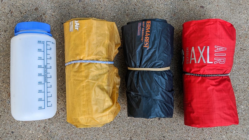 The UberLite (center) is smaller than the XLite (left) and the Big Agnes AXL Air (right), all size regular. But the difference is small, and I’d say that other factors should drive your buying decision.