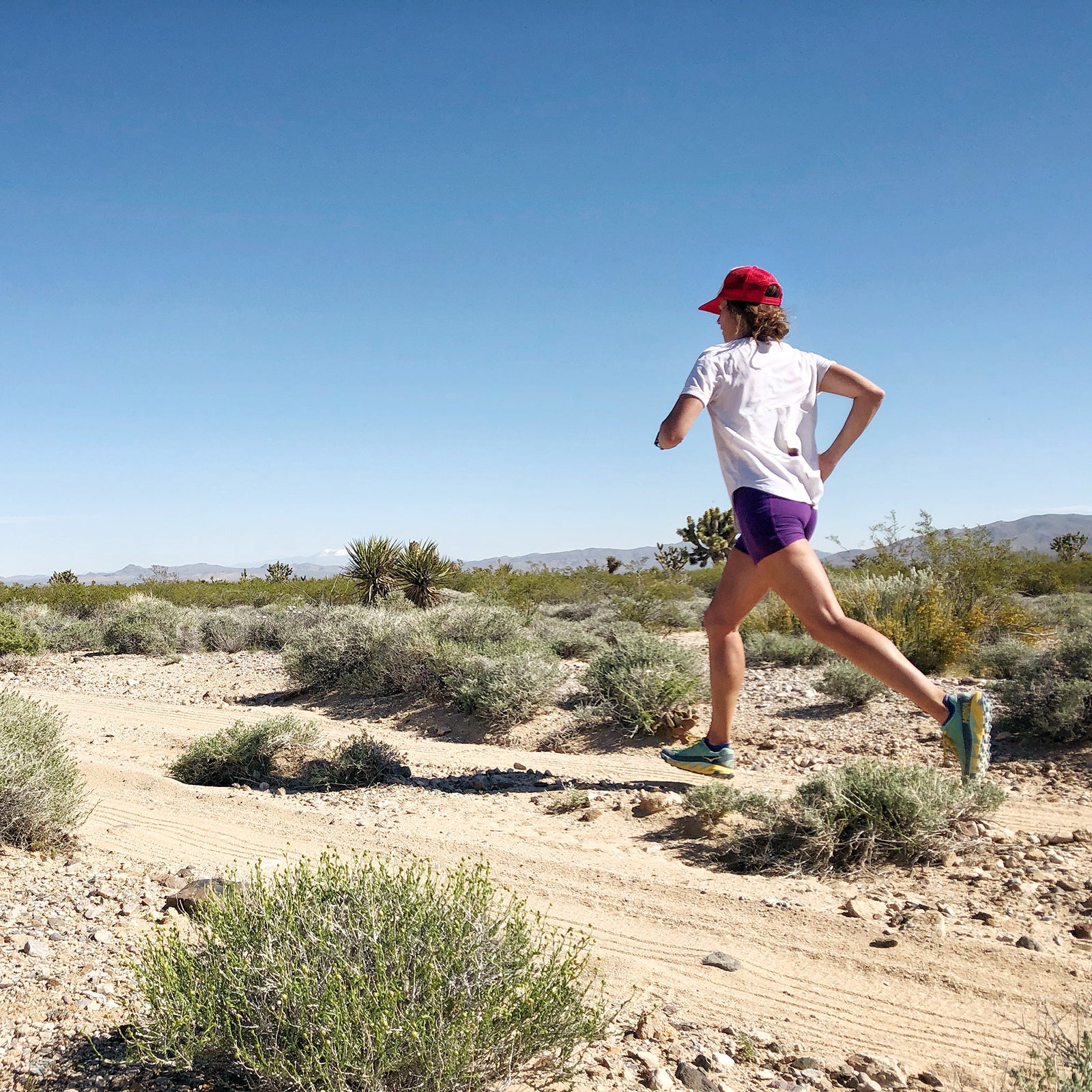 woman running in short shorts